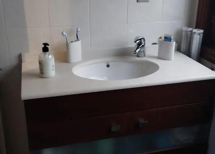 In With A Community Pool Miengo